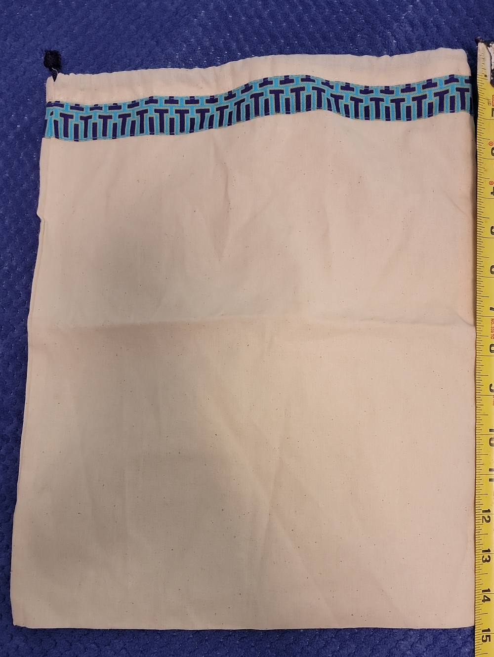 Tory Burch Cream Dust Bag with Teal and Navy Logo Trim